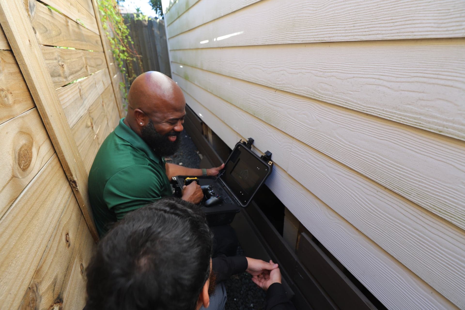 AlouTech operator preparing crawlspace visual inspection documentation