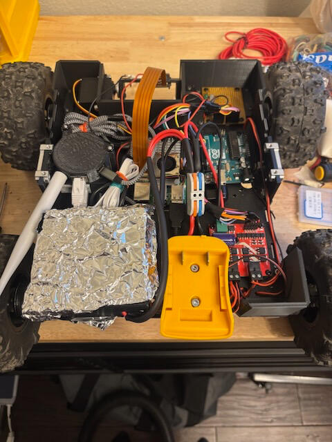 August 2025, 3rd prototype finished, and the theory for the reworked radio system and user interface works field testing proved a range increase of up to 10x the distance of the previous solutions only issue was that the drive train was outdated.