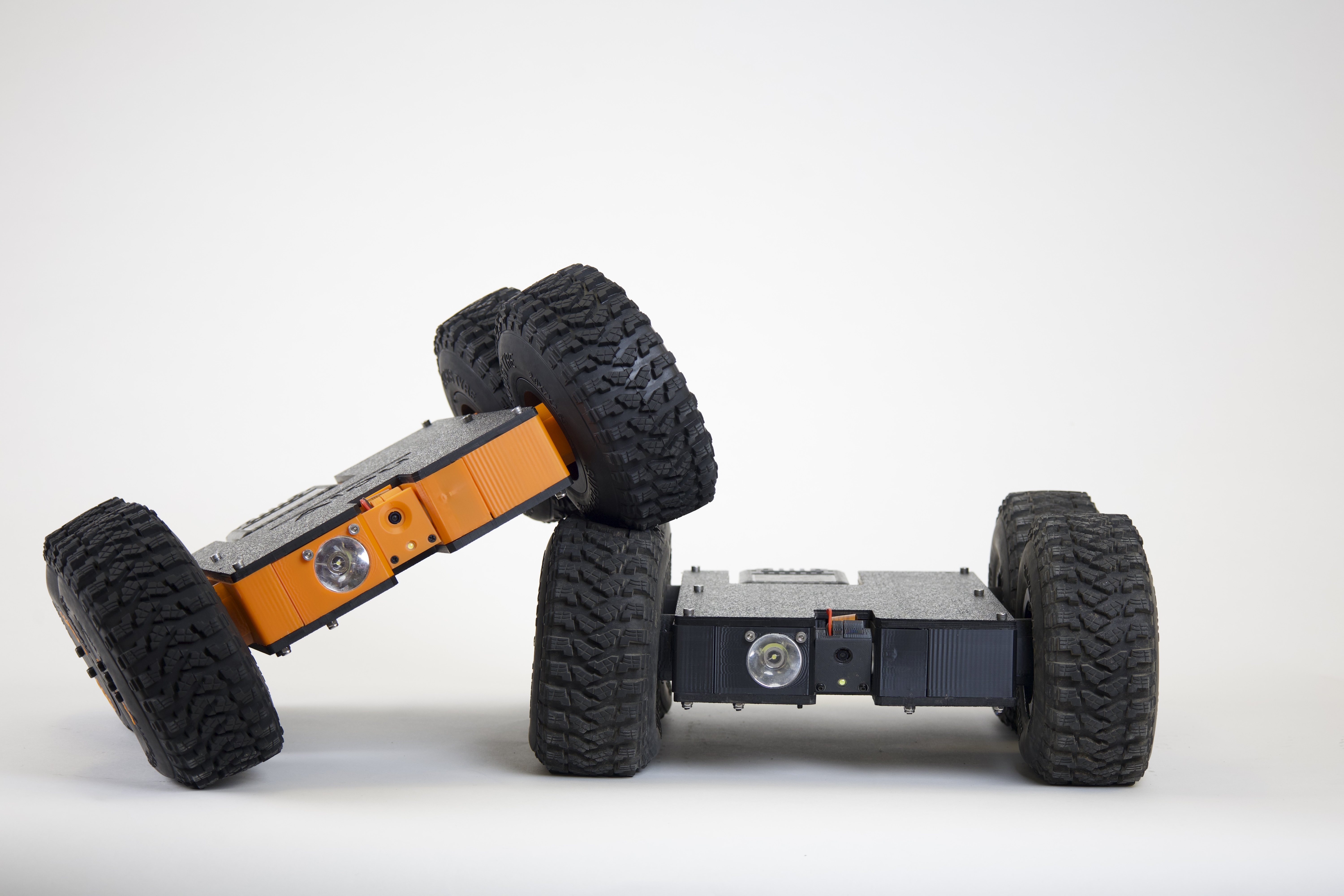 Two Scrutinizer crawlspace robot units
